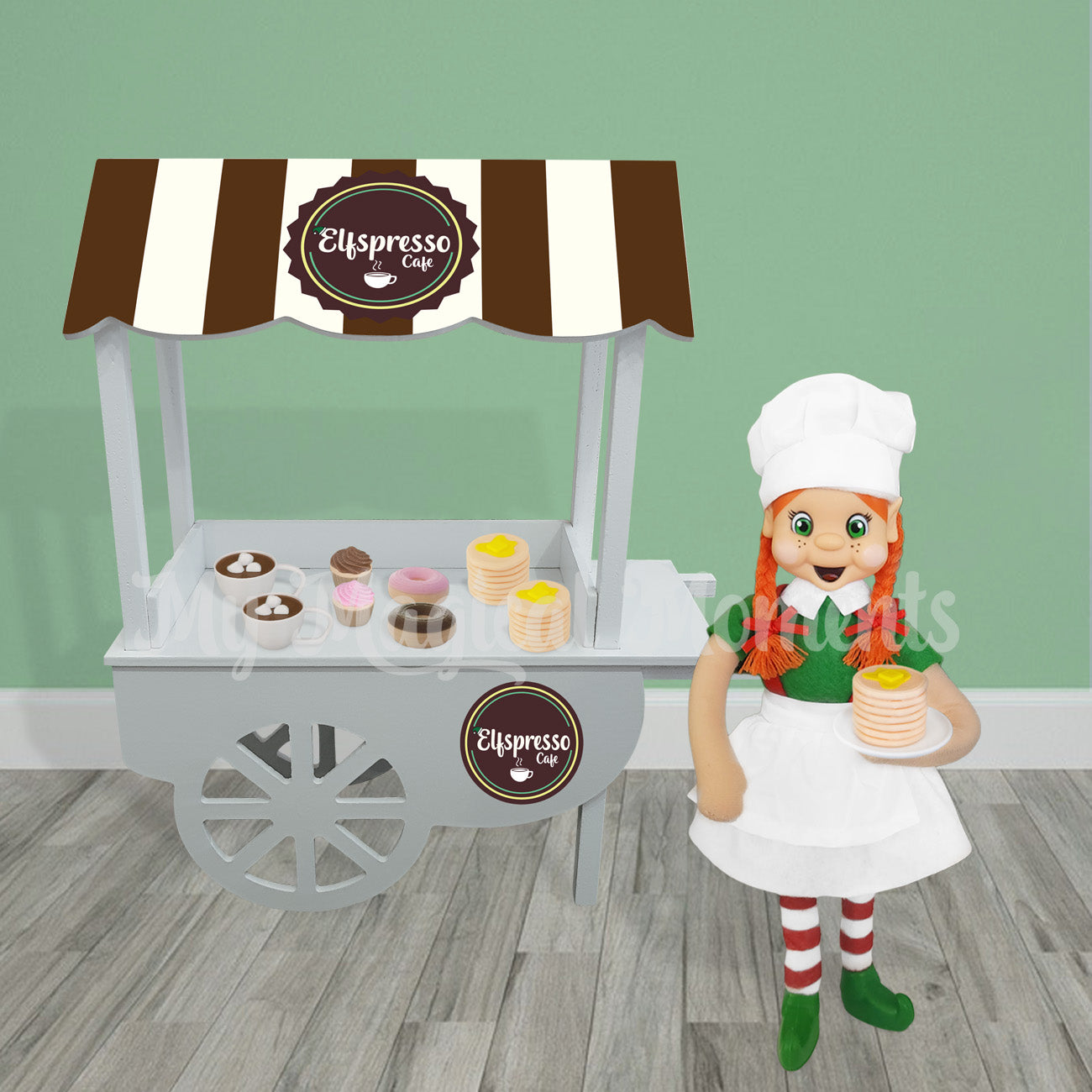 Elf selling pancakes, hot cocoa , donuts and cupcakes at a cafe