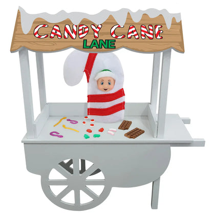 Elf candy store with a miniature baby candy cane, chocolate and lollies