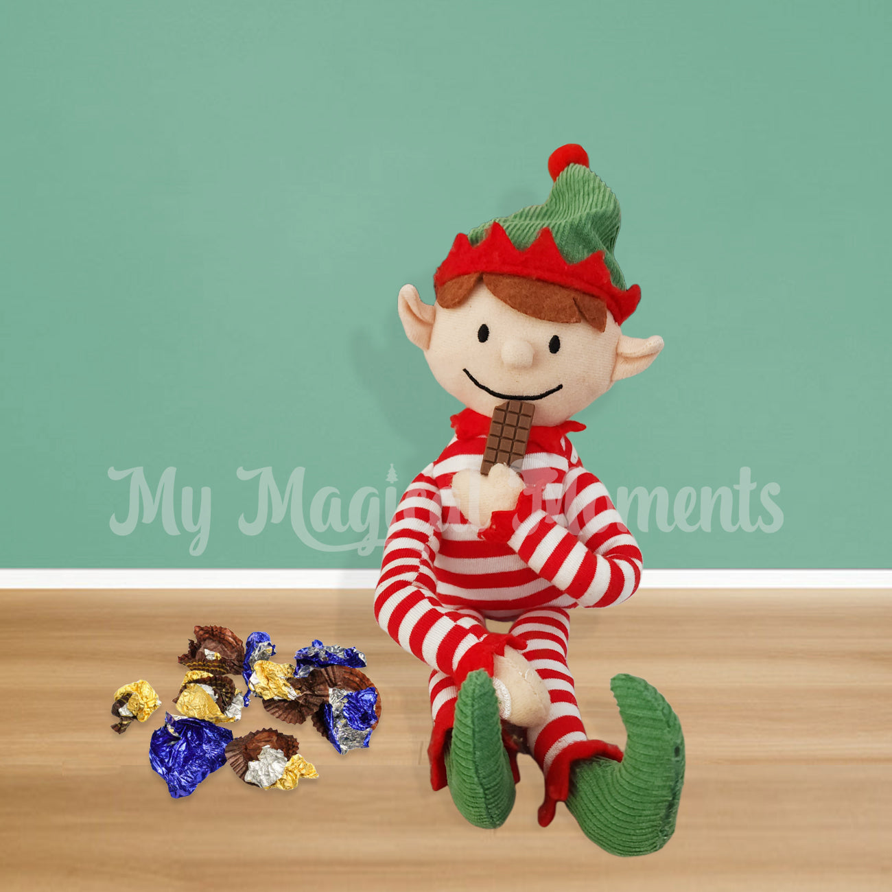 Chocolate elf food prop in a elf scene with an elf for Christmas