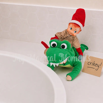 elf wrestling another elf dressed as a crocodile