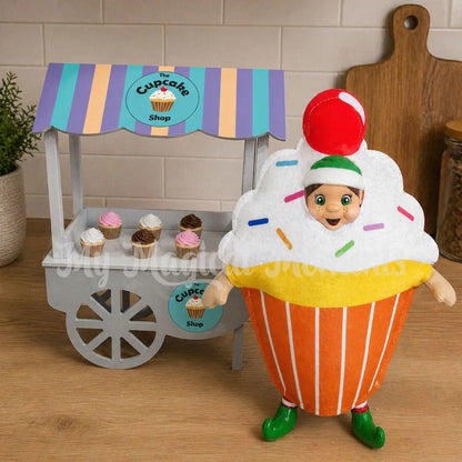 Elf dressed as a cupcake selling miniature cupcakes at her shop