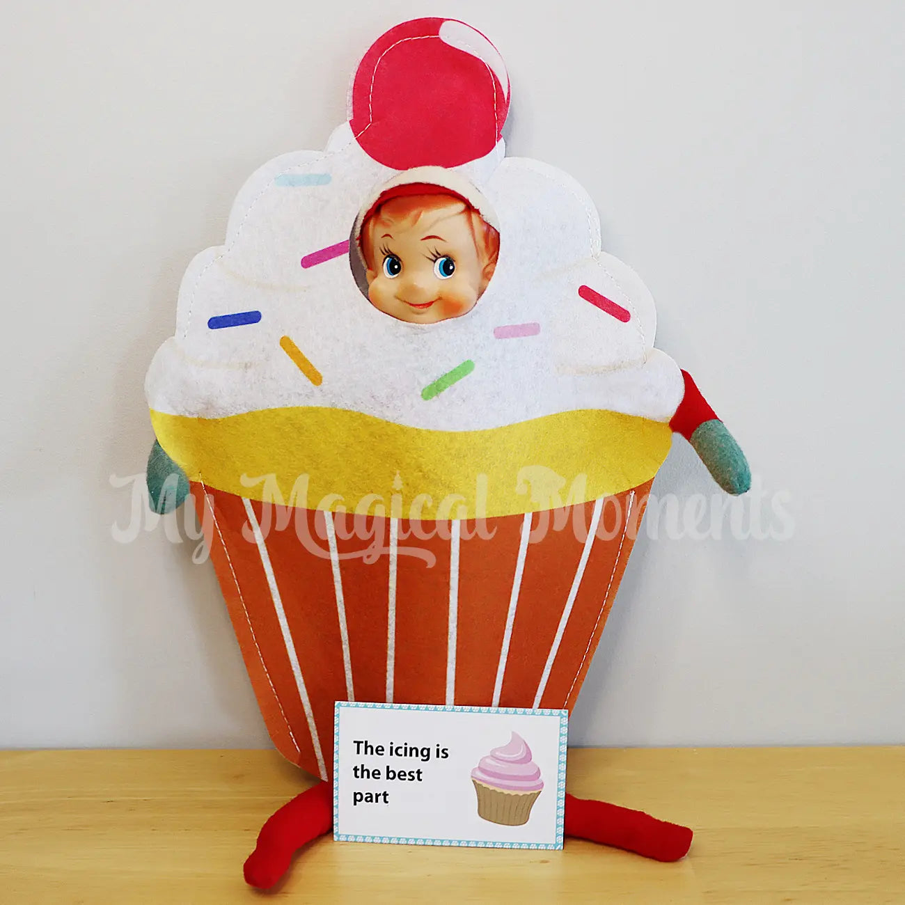 Elf wearing a cupcake costume 