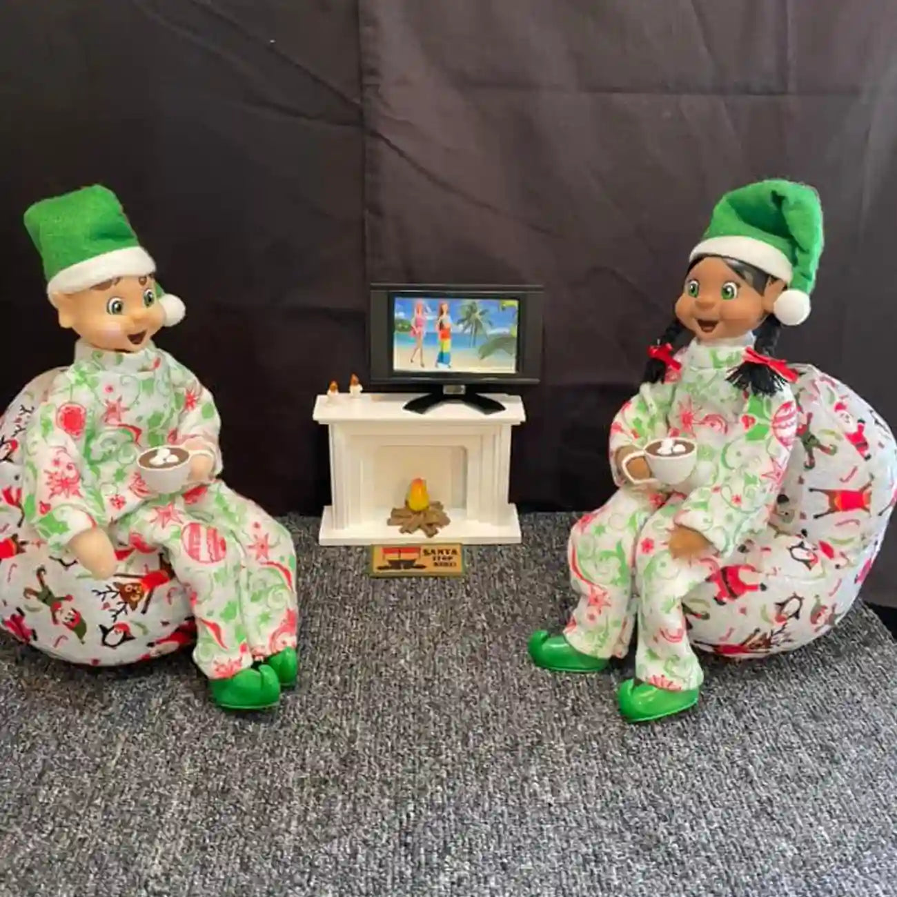 elf friends sitting on bean bags drinking hot cocoa customer photo