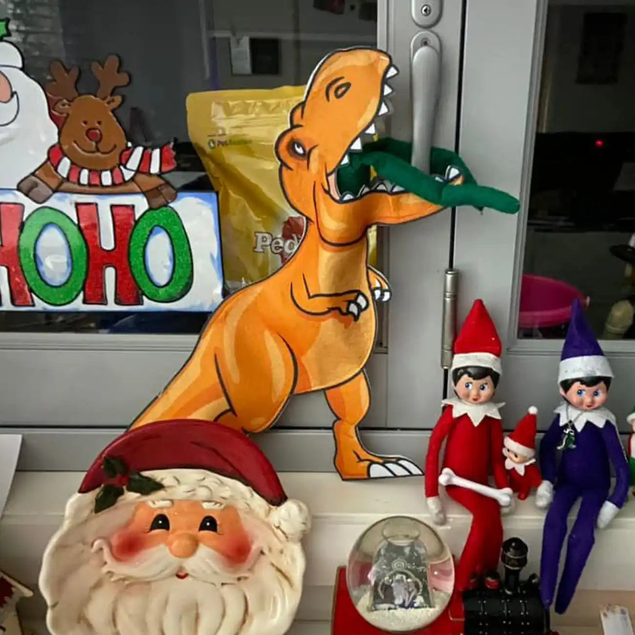 Elf being eaten by a dinosaur customer photo