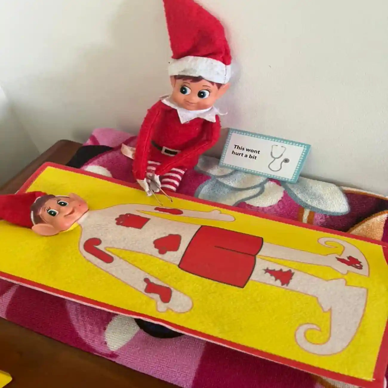 elves playing operation customer photo