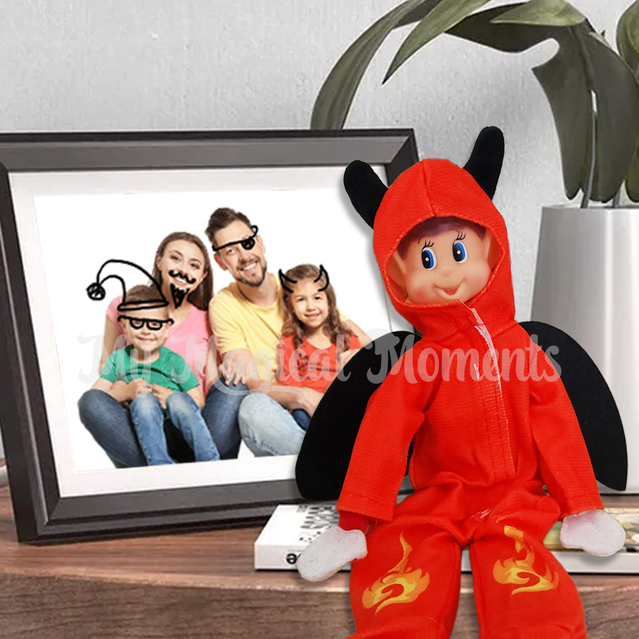 Devil Elf outfit worn by elves behavin badly drawing on family portrait