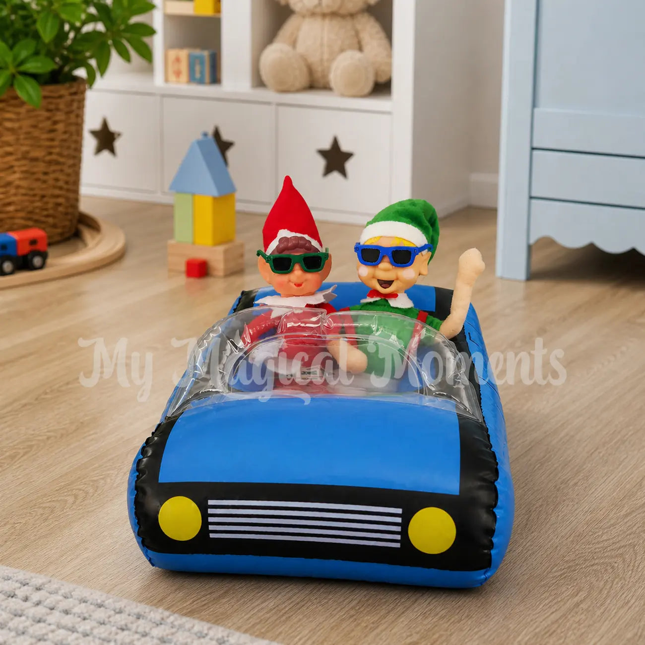 elves driving int the home in  a playroom in an inflatable car
