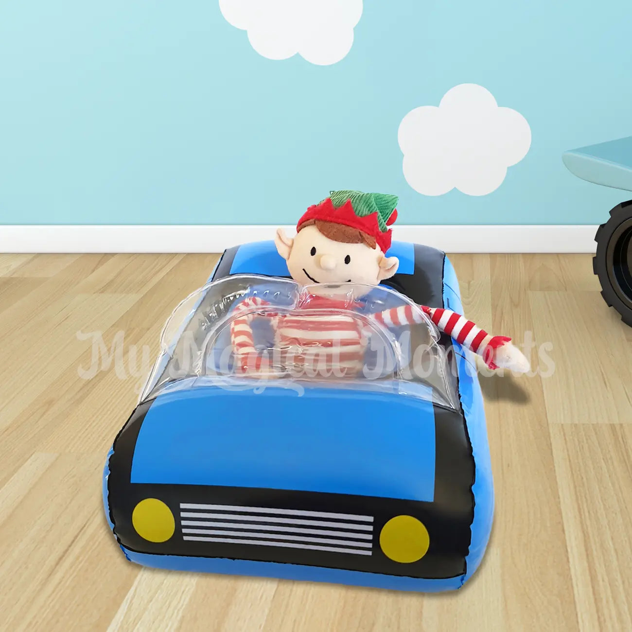 Elf driving an inflatable car