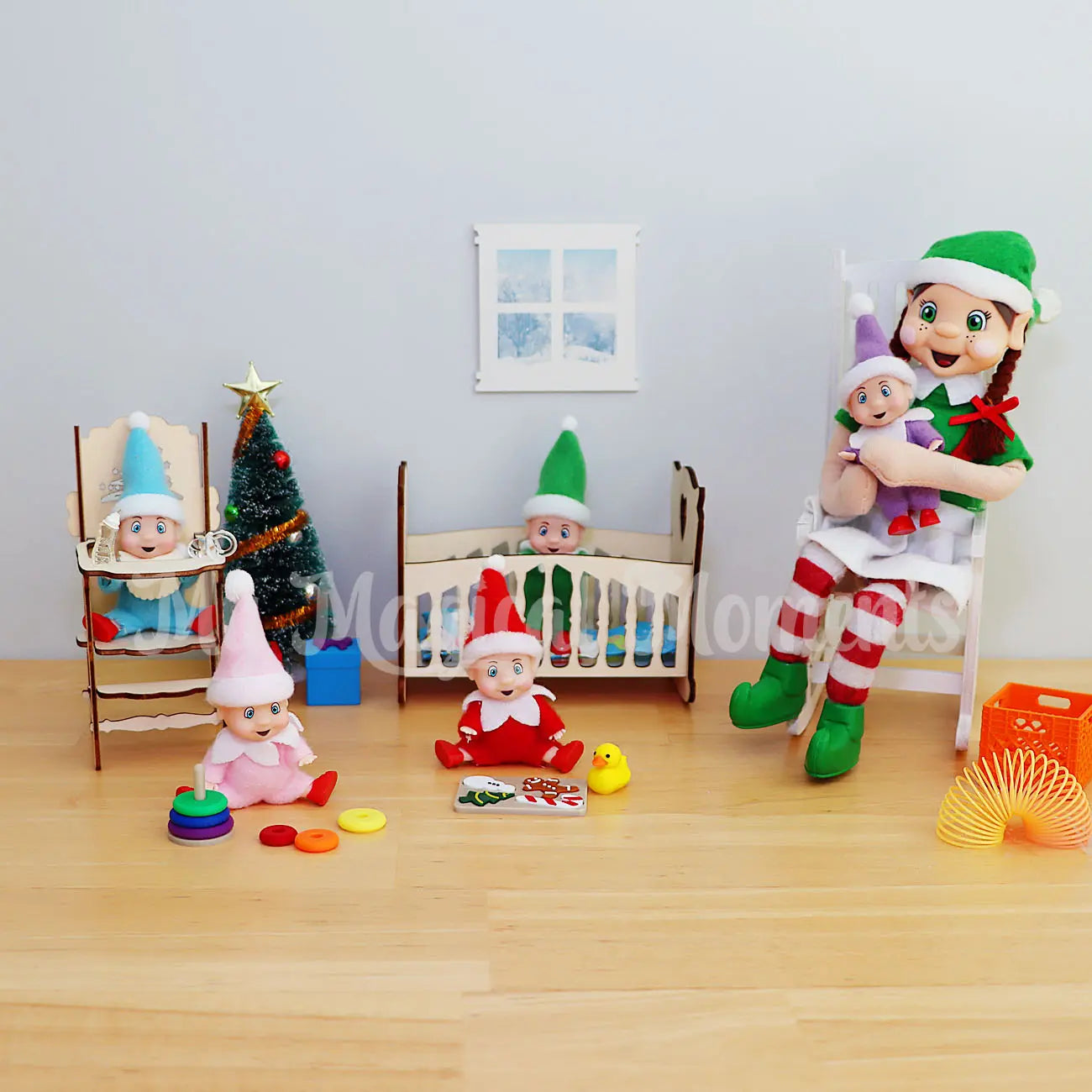 Elf babies in a nursery with bendable brown hair elf and elf props