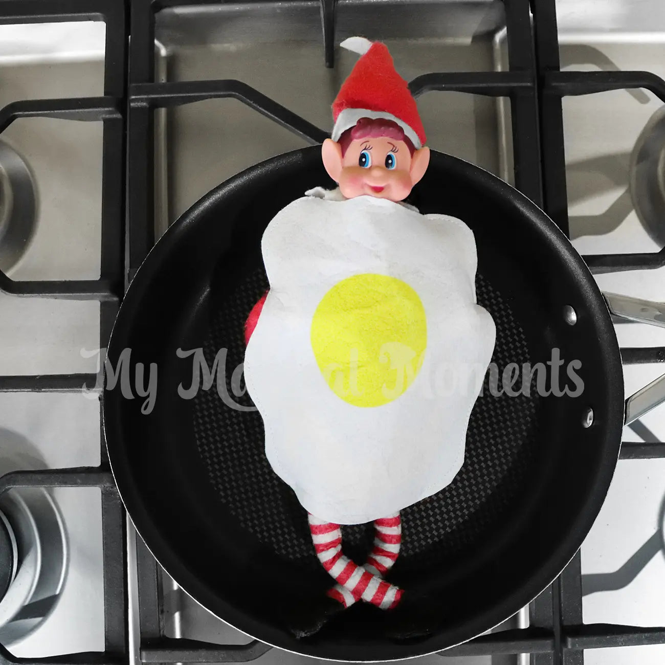 Elf wearing an egg costume in a pan