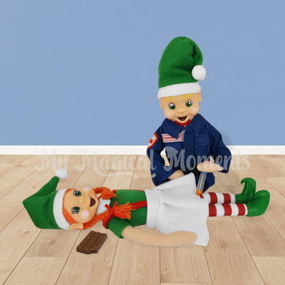 Paramedic elf applying Epi pen to allergic elf