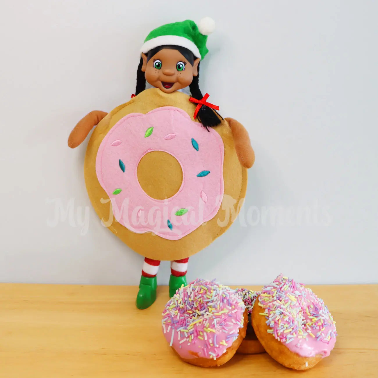 Black Hair Elf Standing wearing a donut costume