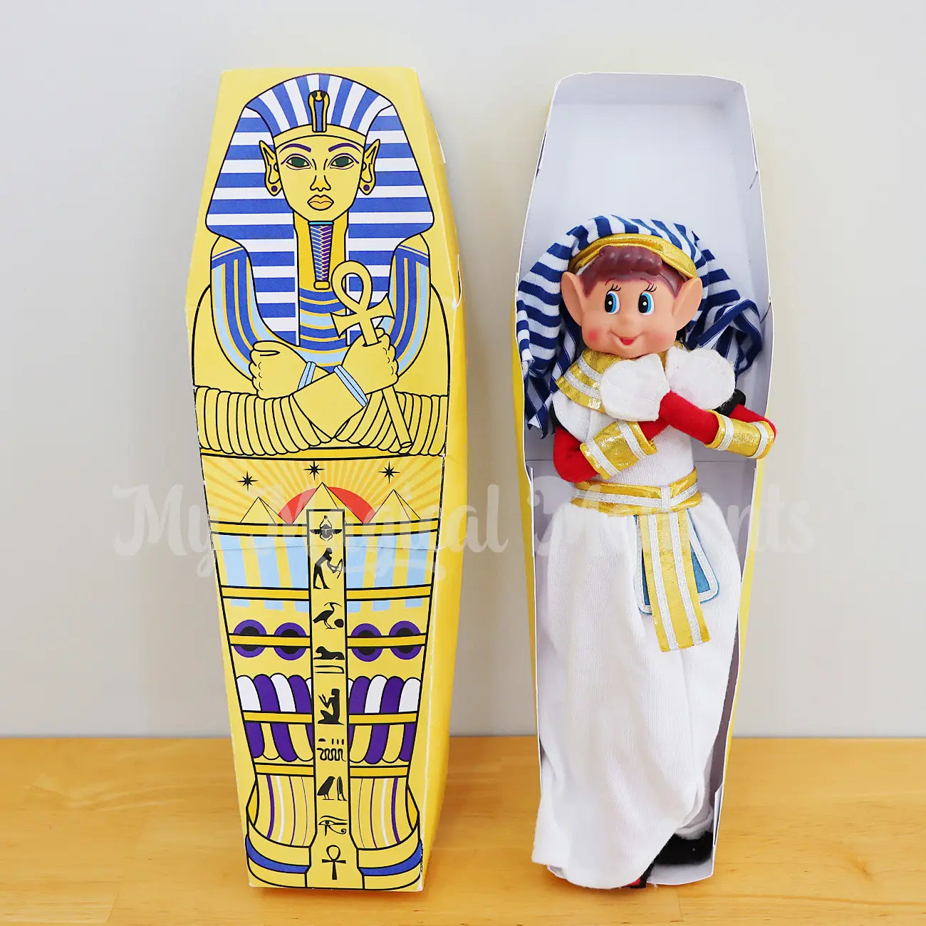 Elf dressed as a pharaoh in a printable elf sarcophagus