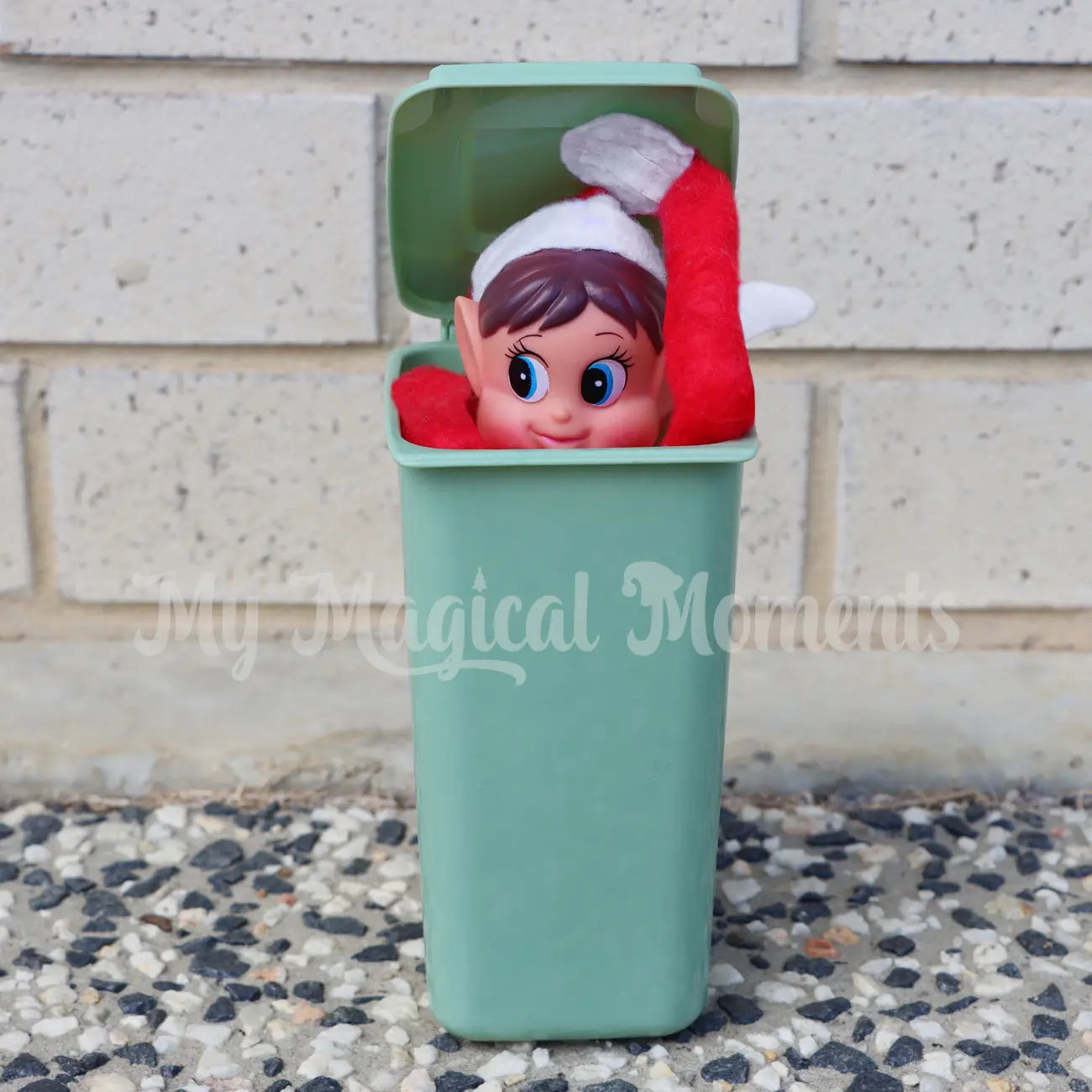 Elf hiding in a elf bin prop