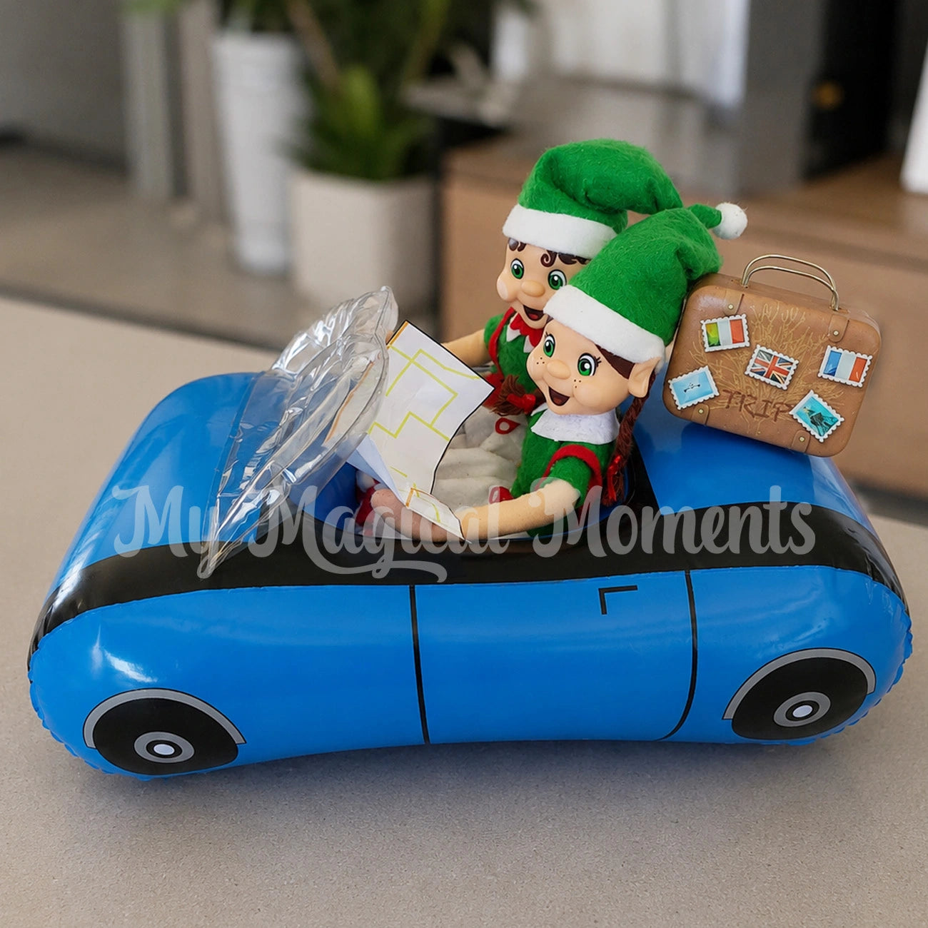 brown hair elves driving in an inflatable blue car, with a suitcase using a map 