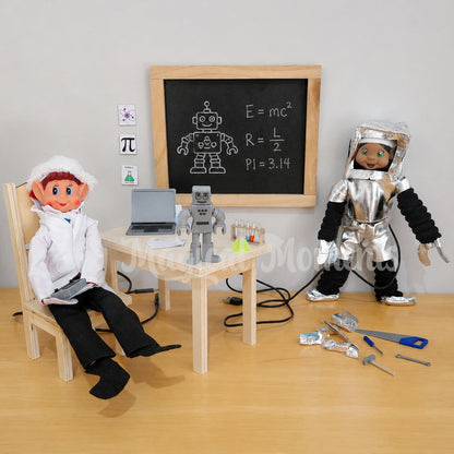 elf dressed as a scientist, doing experiments building robots, there is a black hair elf standing wearing a robot costume, mini tools on the ground with cables. A mini table and chair set with a robot, chemistry set, laptop, a chalkboard with a robot equation  in chalk