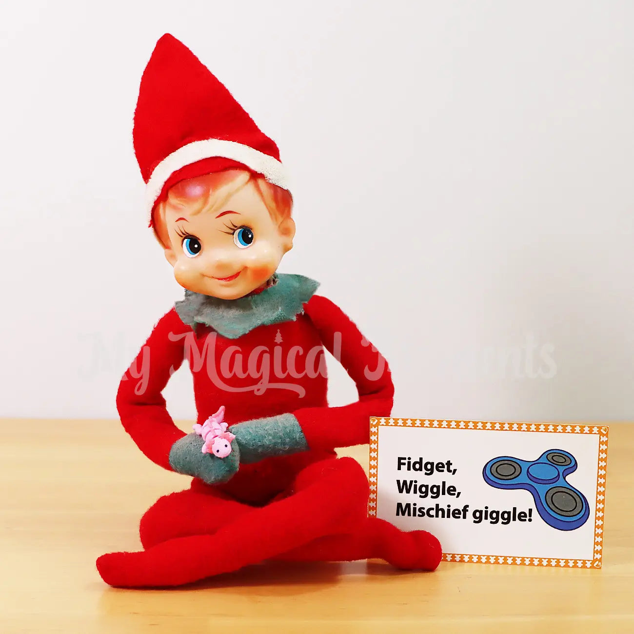 Elf with mini pink axolotl fidget 