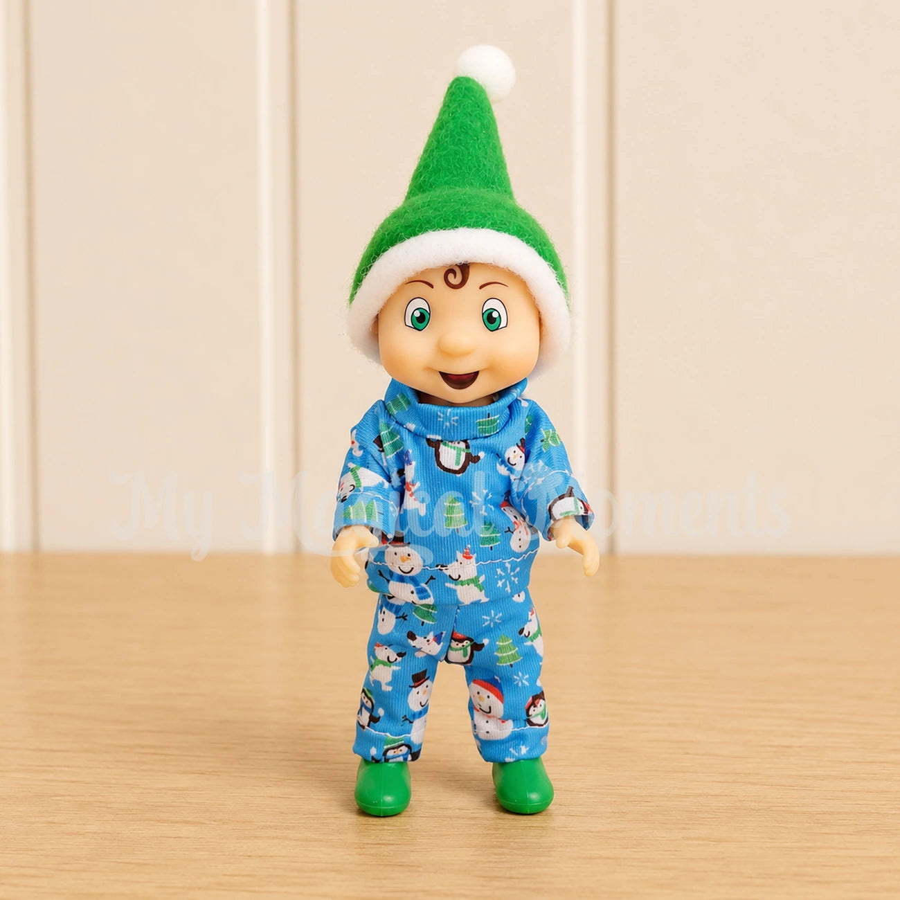elf toddler wearing blue pyjamas