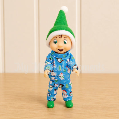 elf toddler wearing blue pyjamas