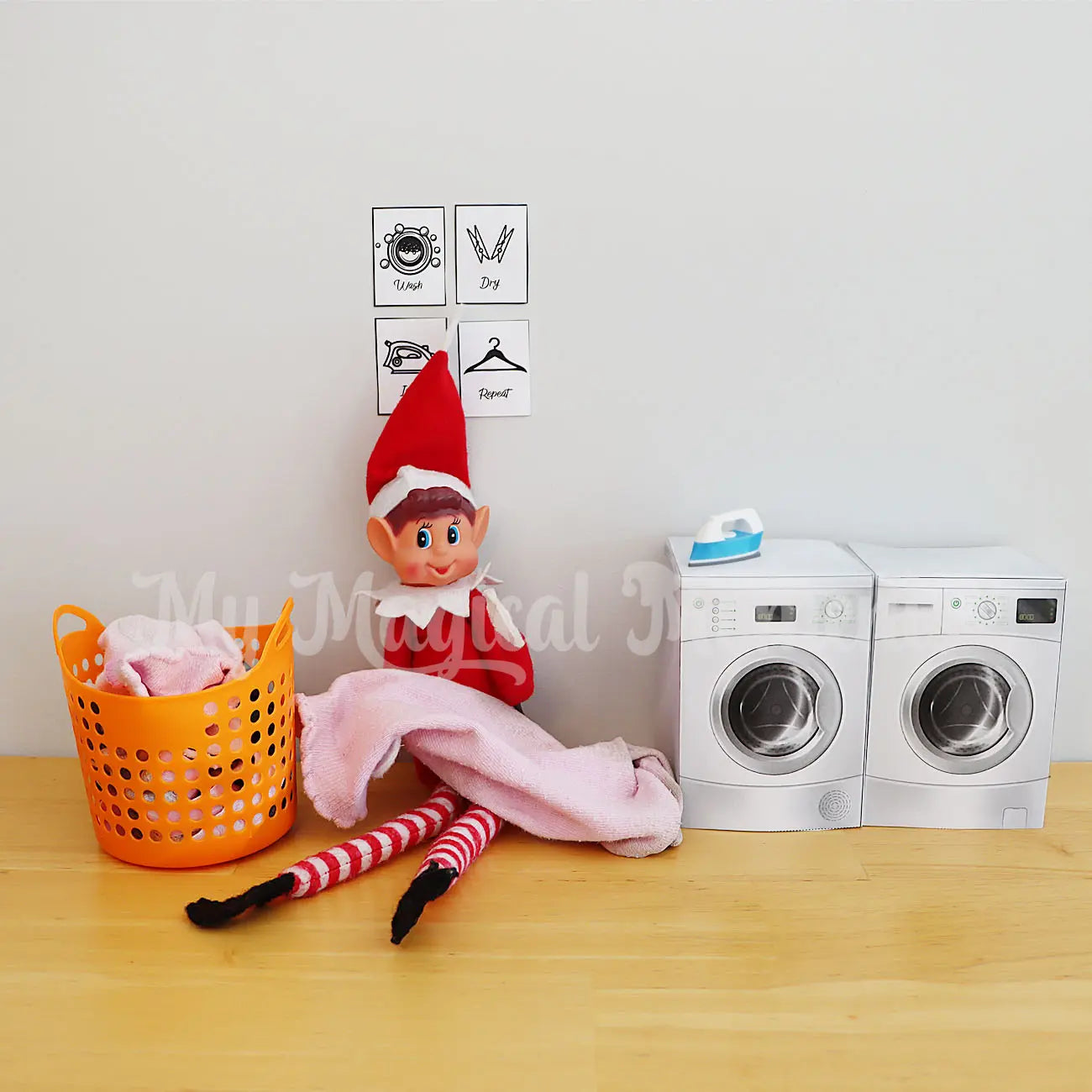 Elf Doing washing with miniature washing machines