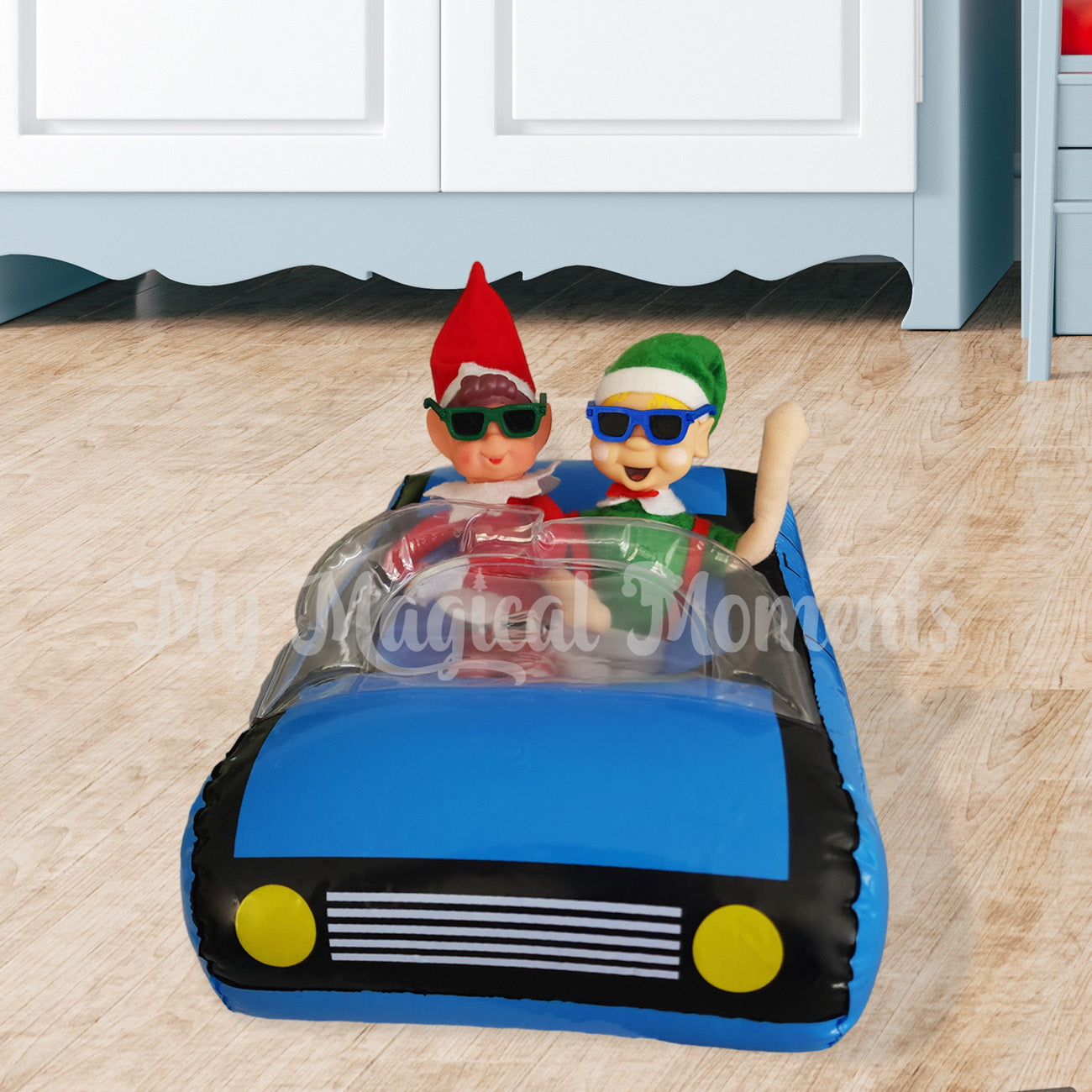 Elves driving in a car wearing sunnies