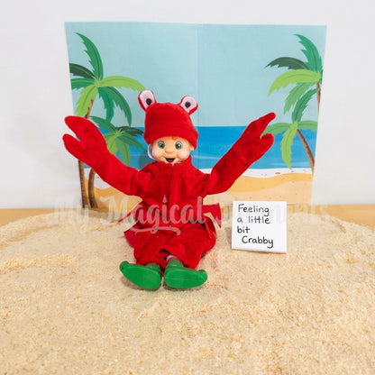 orange hair elf wearing a crab costume, sitting on sand in front of a beach scene. with a little sign saying feeling a little bit crabby