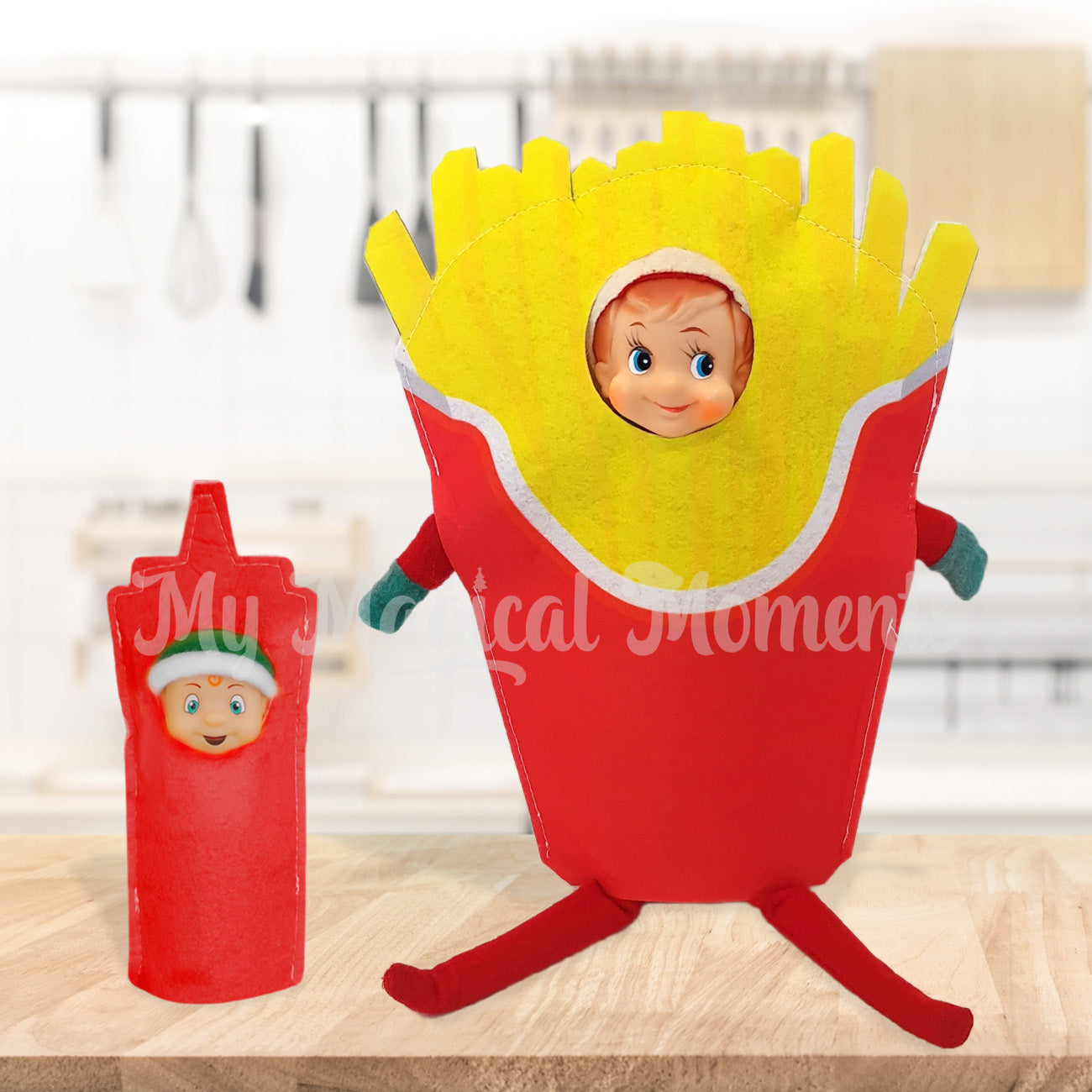 Elf dressed as hot chips and ketchup bottle worn by an elf toddler