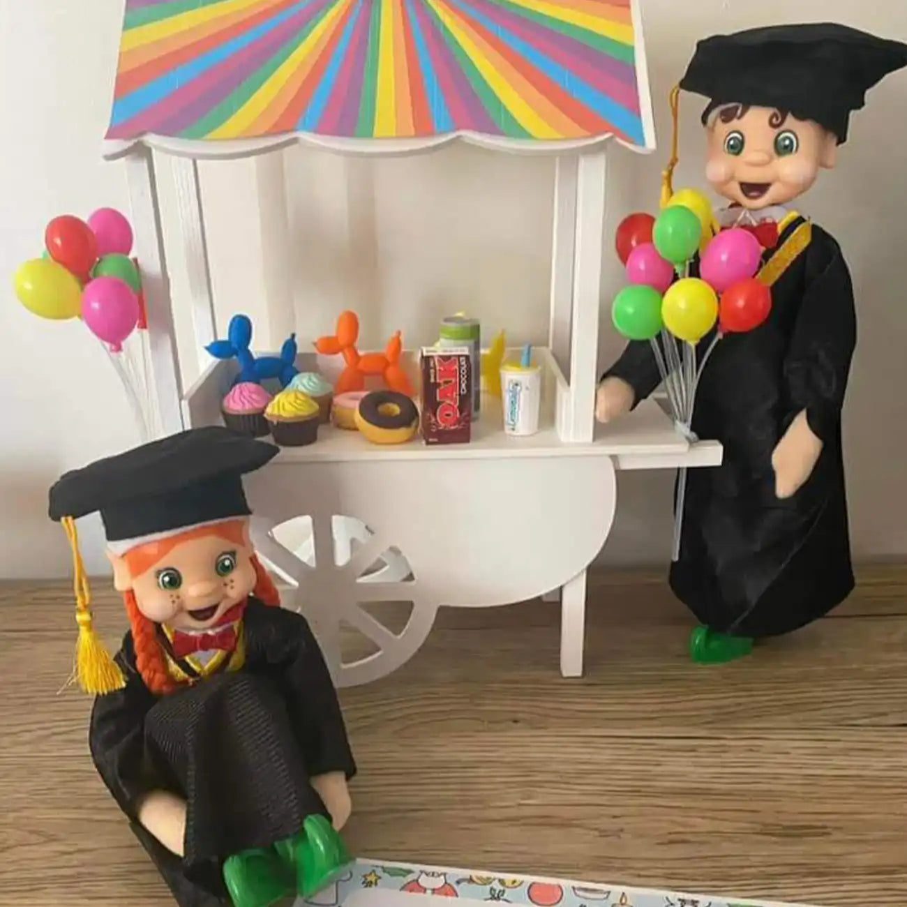 Elf customer graduation scene