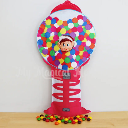 Elves behavin badly wearing a gumball machine costume