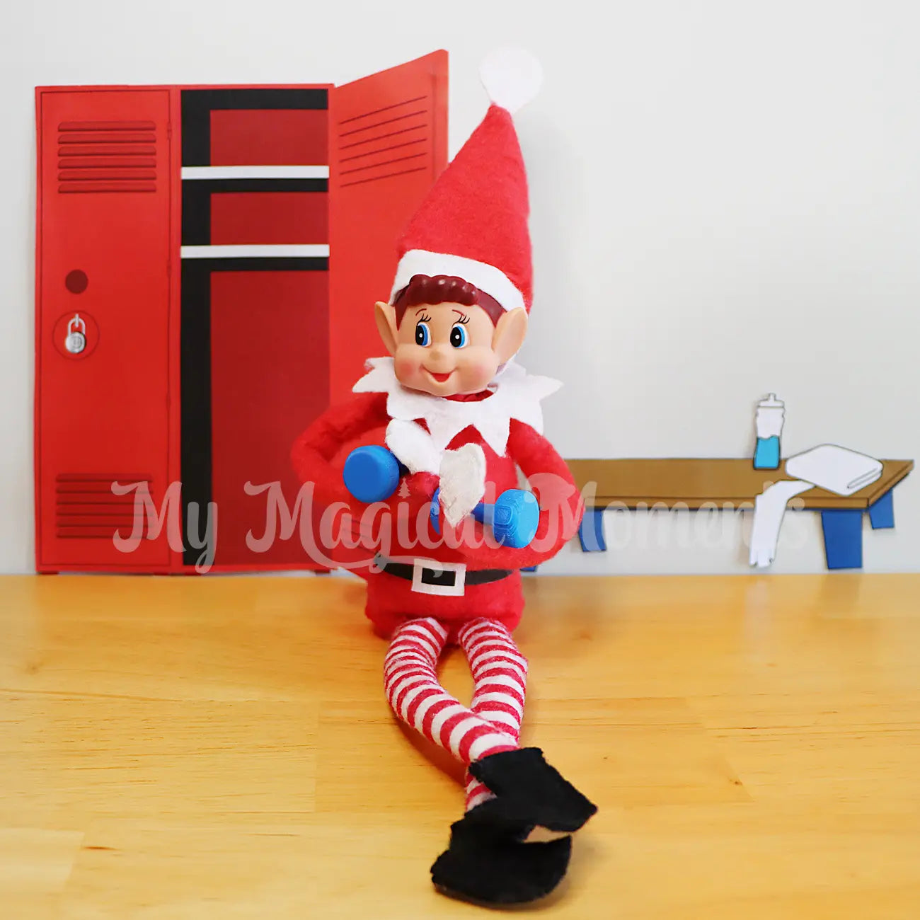 elf holding mini weights in a gym