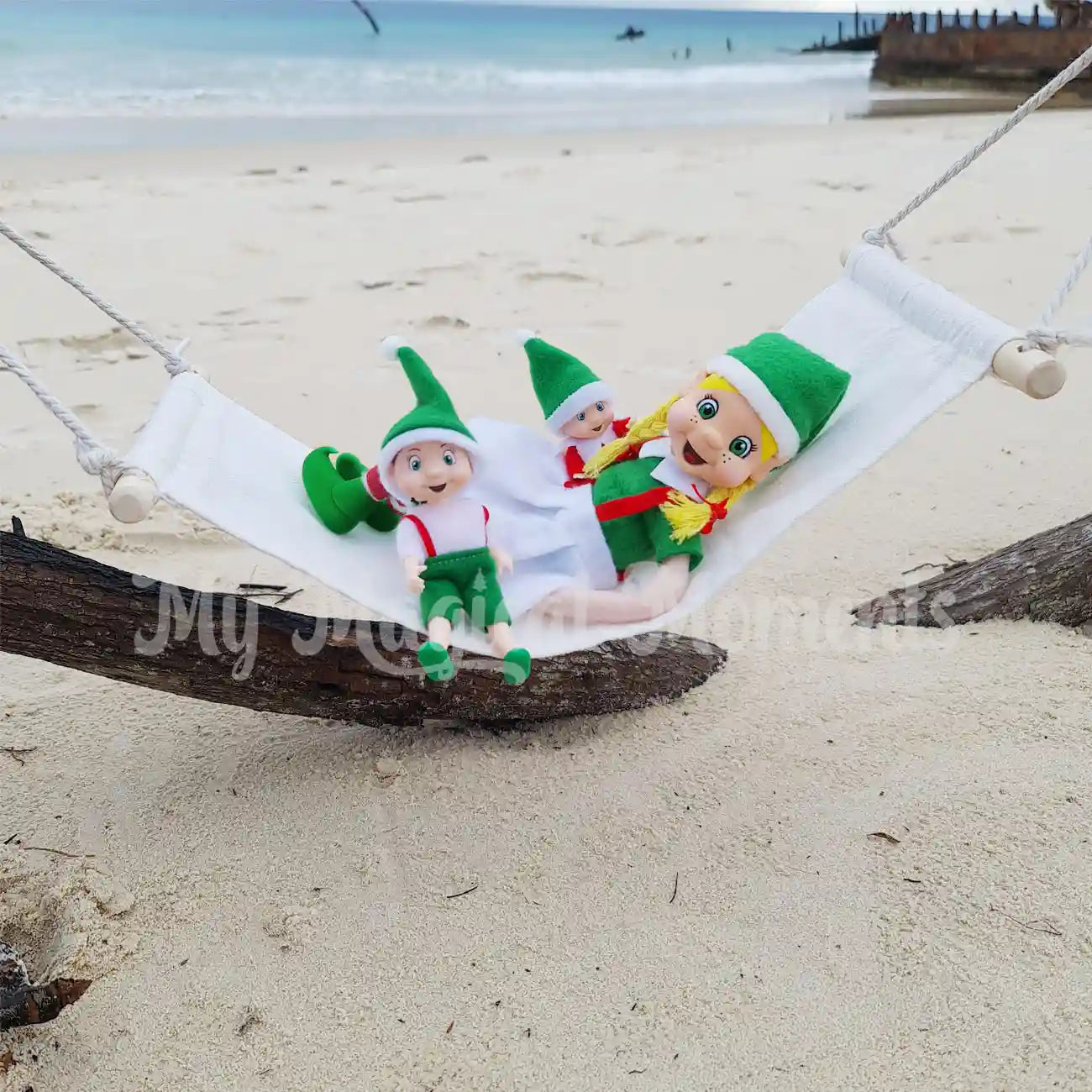 elf family on a hammock at the beach