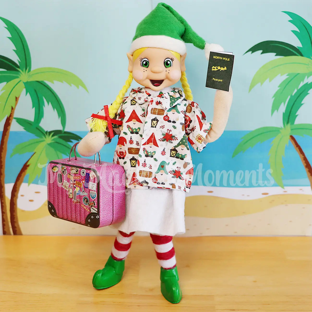 My Elf friends wearing an hawaiian shirt holding a mini suitcase with passport