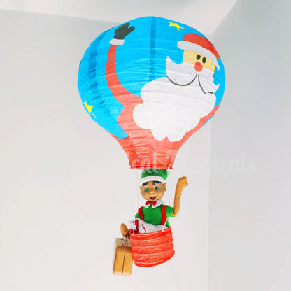 My Elf Friend Waving in a hot air balloon with a suitcase