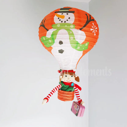 an elf for Christmas girl elf in a hot air balloon