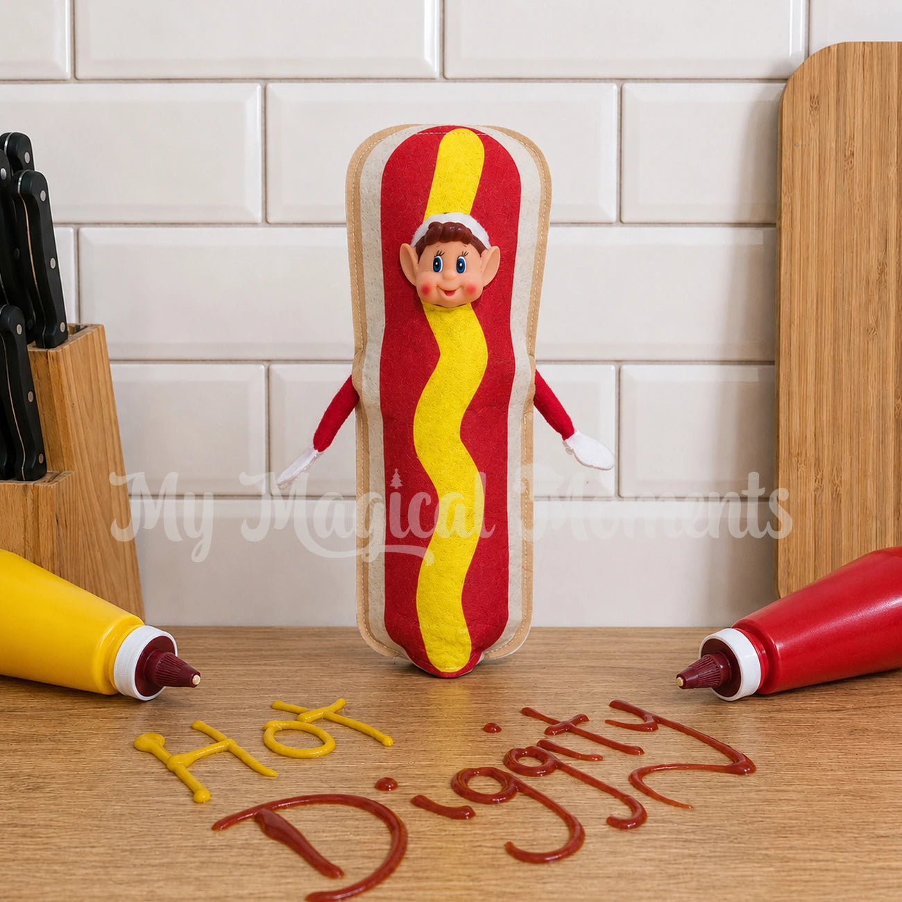 Elf wearing a hot dog costume, with the words hot diggity written in tomato sauce and mustard in a kitchen