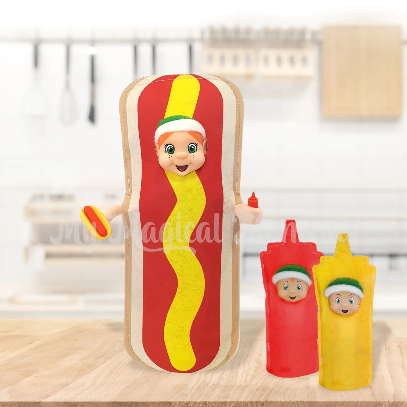 Elf dressed as a hot dog with elf toddlers dressed as tomato sauce and mustard