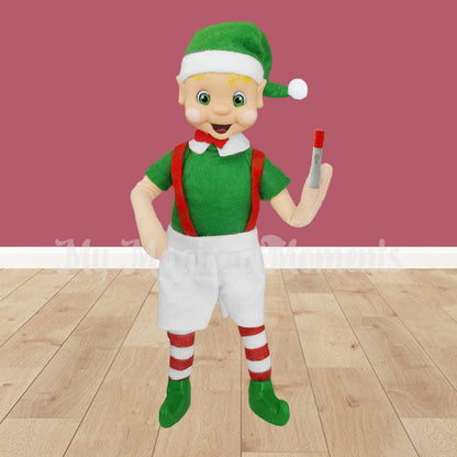 Elf holding miniature Humira pen