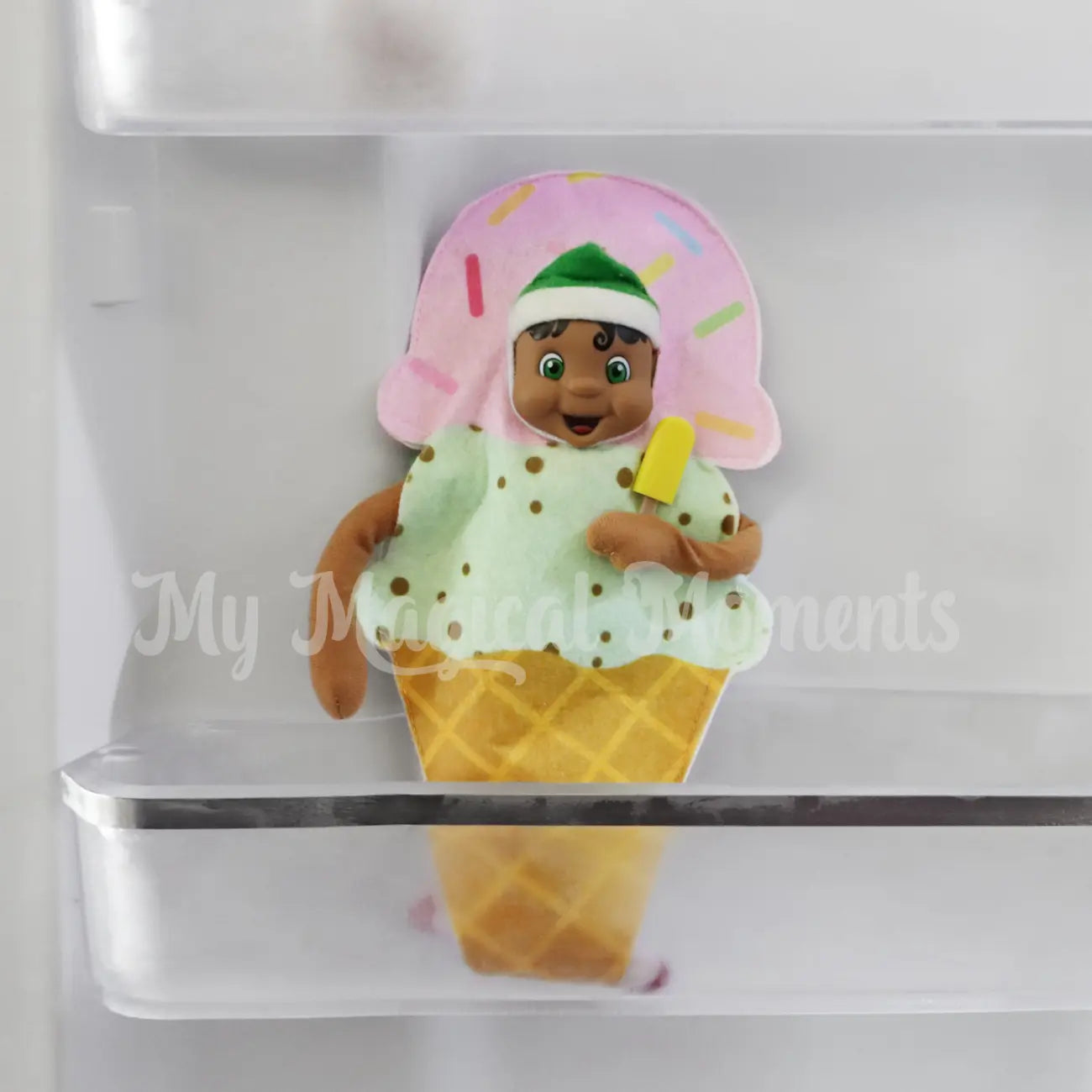 My Elf Friends Elf in the freezer eating a paddle pop dressed as an ice cream