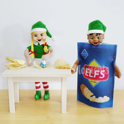 Elves ironing chips with elf dressed as a packet of chips