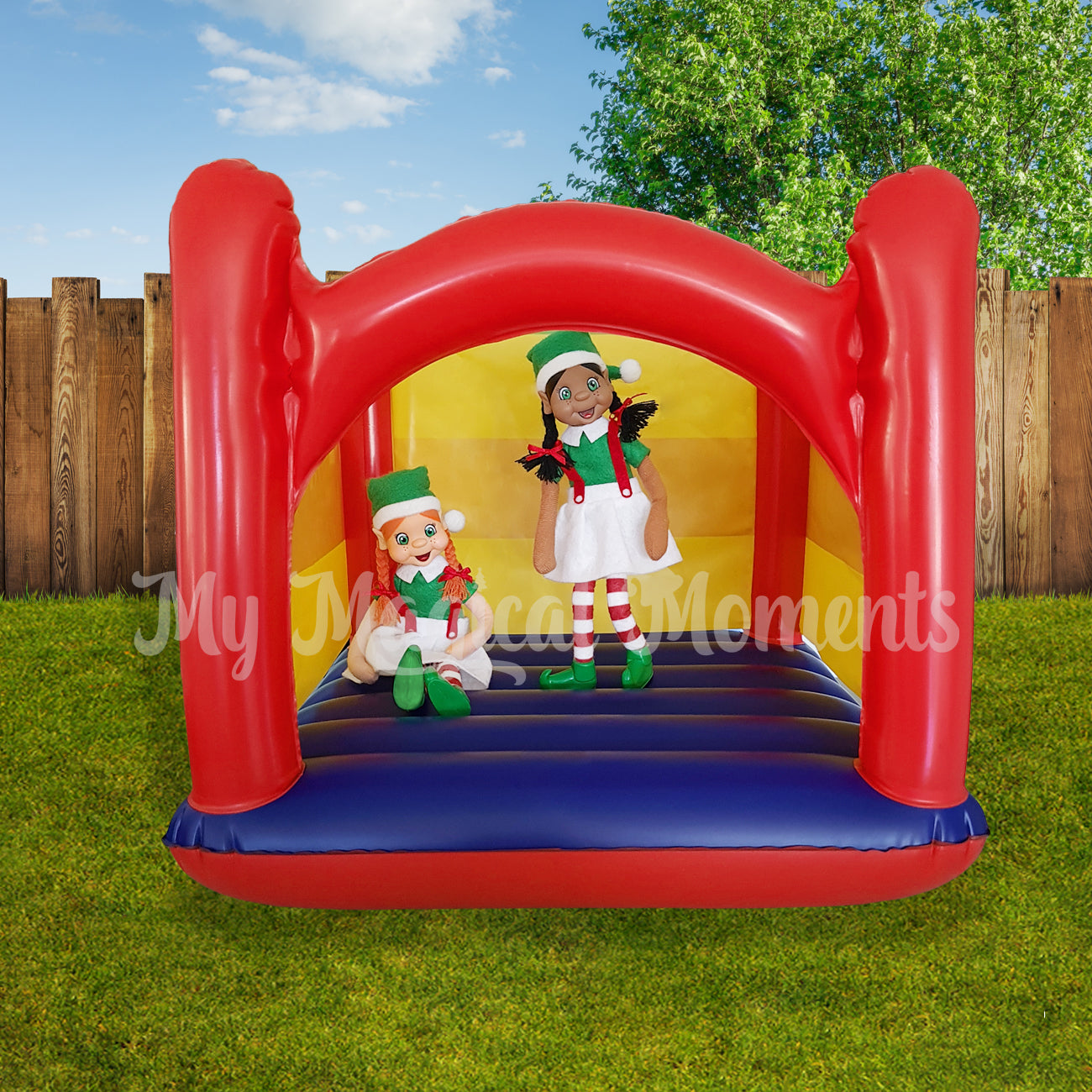 Elves jumping on a miniature jumping castle
