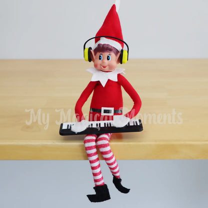 Elf playing a keyboard with headphones