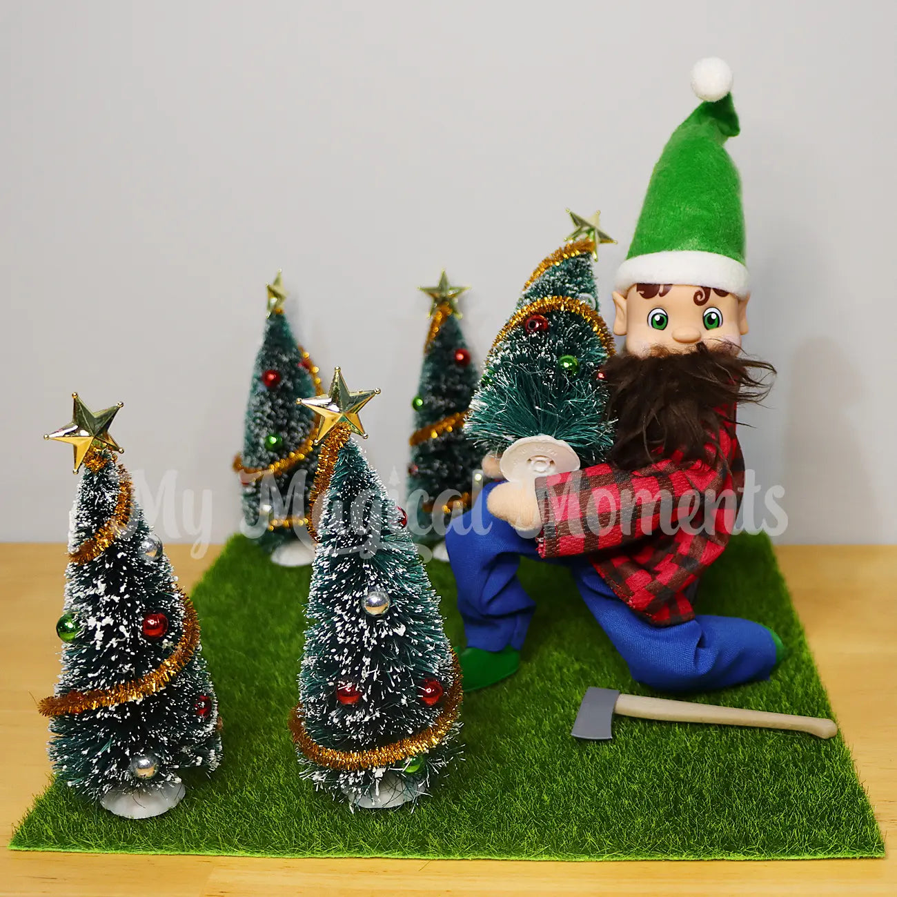 Elf cutting down trees with their mini axe dressed as lumberjack