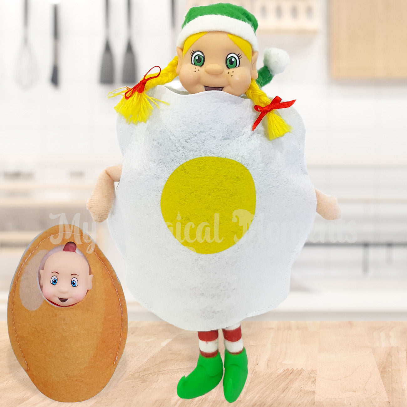 Egg Yolk costume worn by an elf with a baby egg elf for breakfast