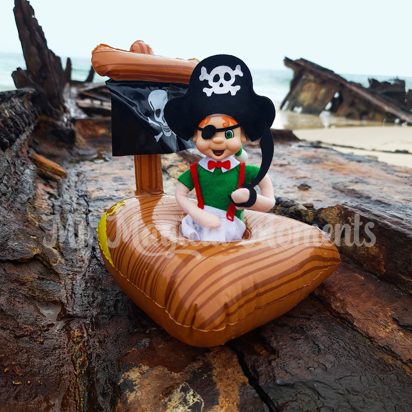 Elf wearing a pirate costume in a pirate ship on moreton island