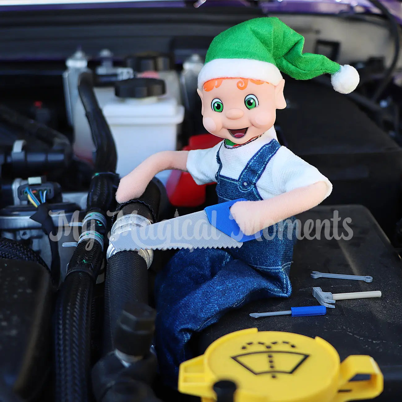 elf sawing and fixing a motor with miniature tools