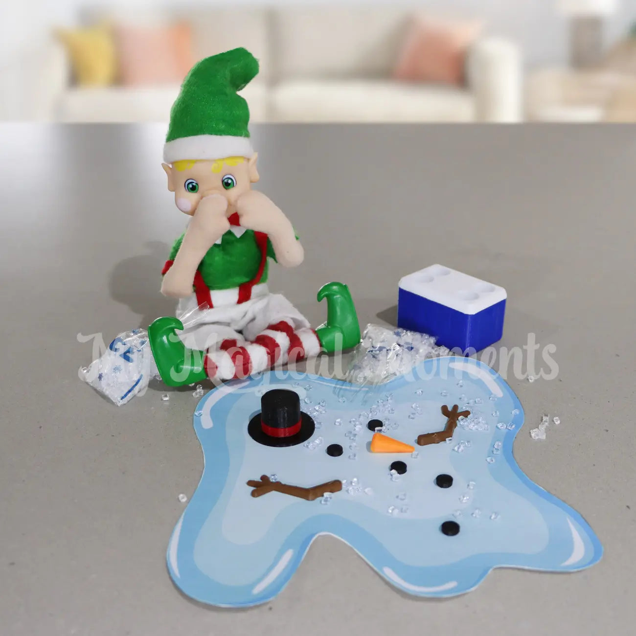 Elf In the kitchen with melting snowman prop