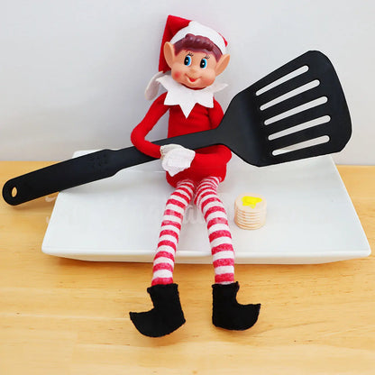 Elf with a mini pancake stack on a plate