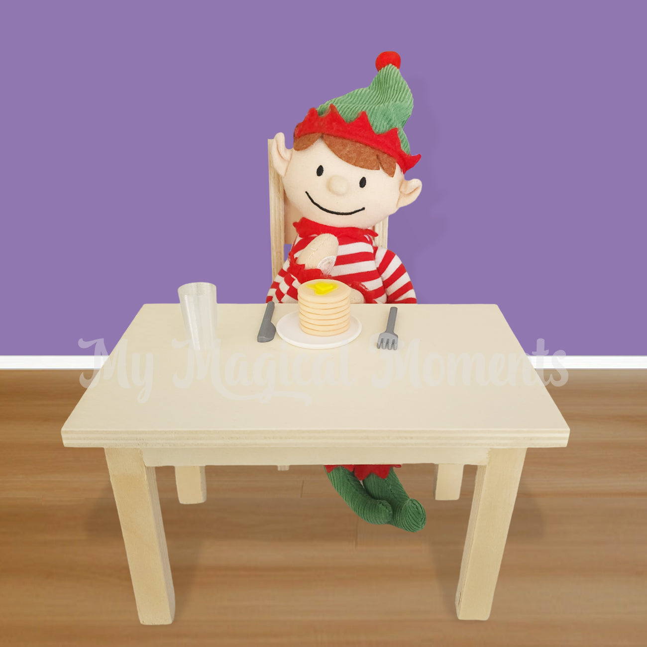 Elf for Christmas eating pancake prop at table and chair set