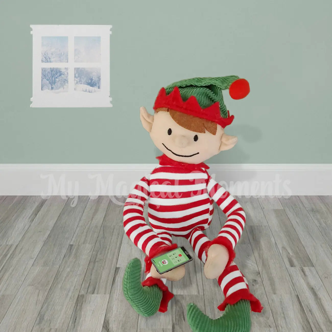 Elf for Christmas with a phone prop