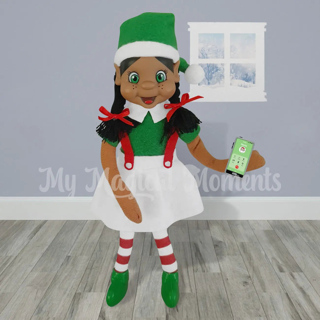 Elf standing with a mobile prop